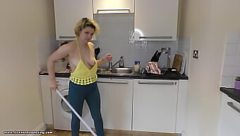 Watch Delilah Clean The Kitchen While Wearing A Sexy Outfit